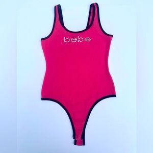 Fuchsia Bebe Ribbed Bodysuit with Black Trim and Rhinestone Logo